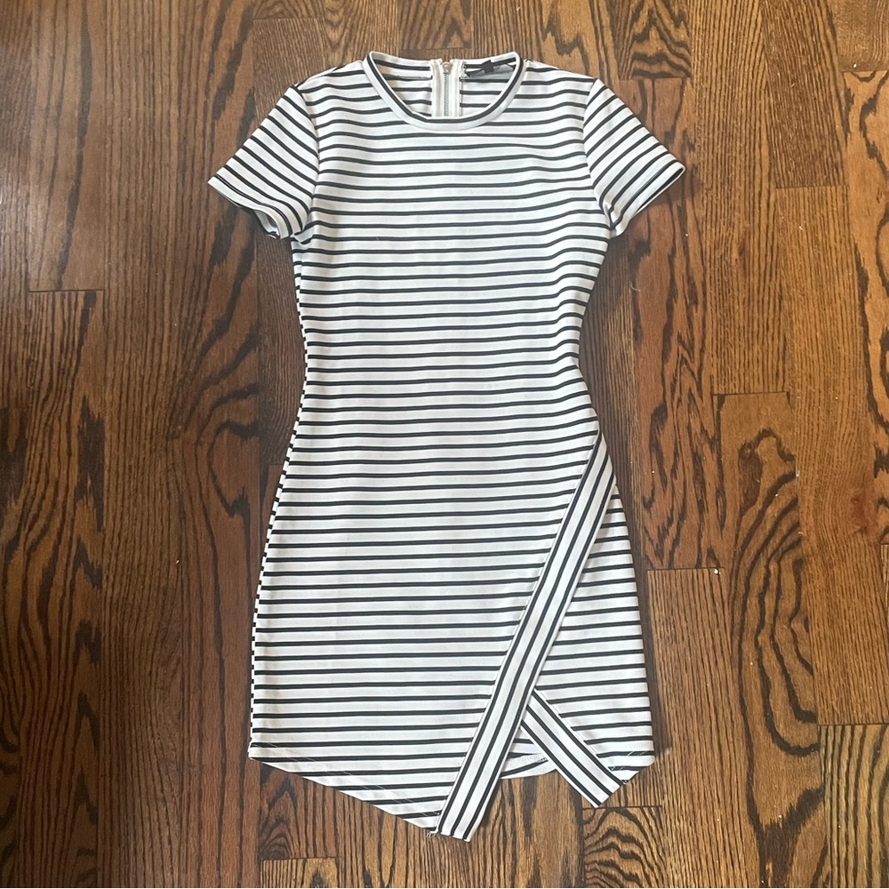 Olivaceous Black and White Asymmetrical Wrap Mini Dress